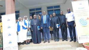 His Grace Archbishop Paul Ssemogerere and URA Commissioner General John R Musinguzi and other delegates posed for a photo after the meeting 