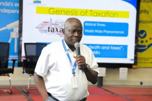 URA official talking to the students 