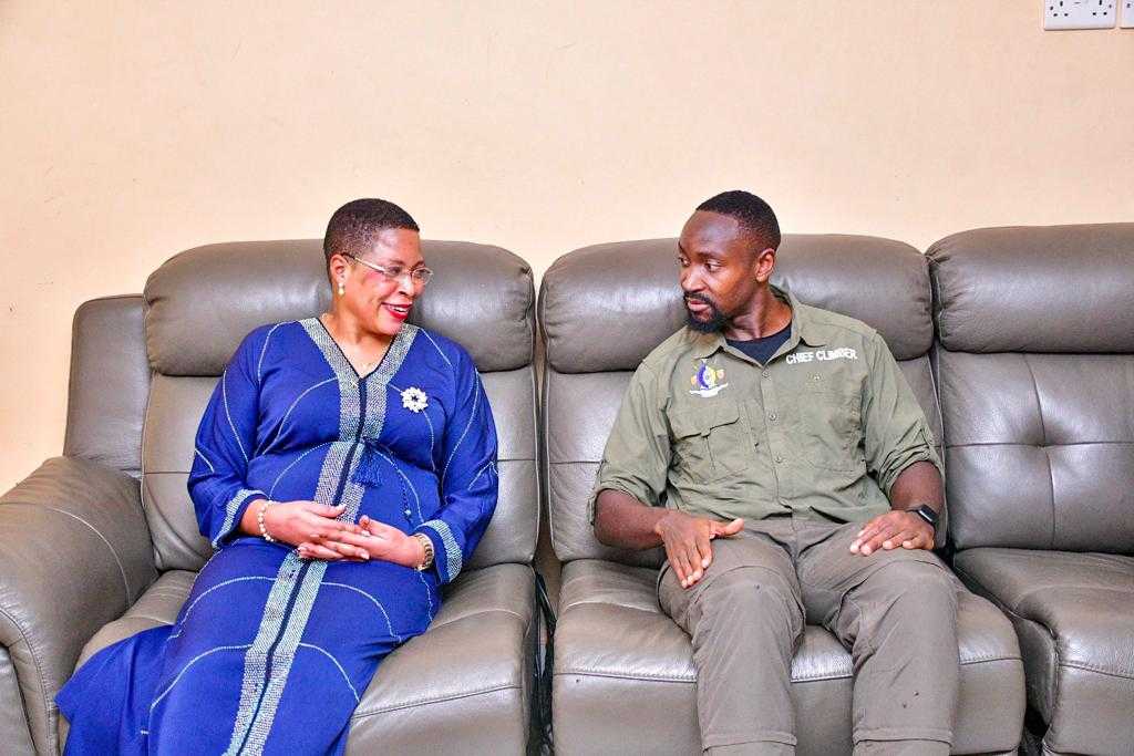 Annet Annita Among seated with Kyabazinga