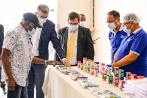 former Nigerian President Olusegun Obasanjo and his team while having a look at some of the milk products